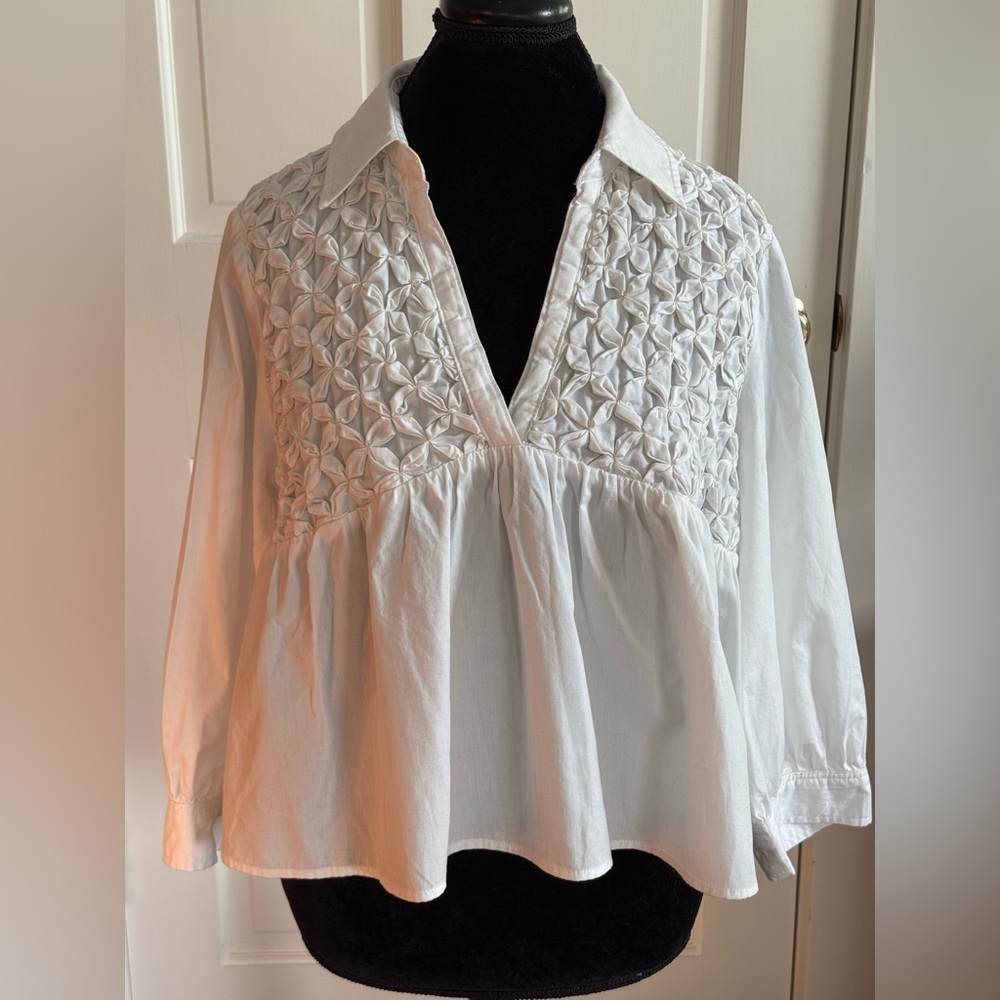 White smocked blouse
